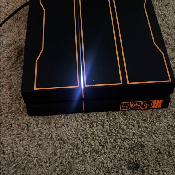 Sony Black and Orange Console with Unique Design - Picture 1 of 4